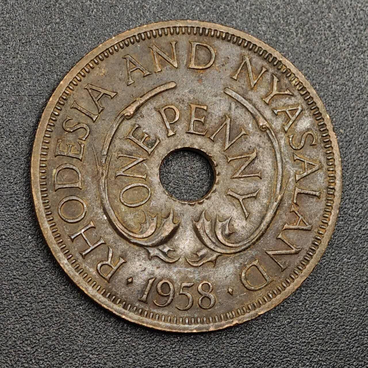 【淘币小摊】限时拍第七百九十七拍  老铜币场  满百包邮可预留两周  周一统一发货  罗德西亚尼萨兰1958年一便士铜币