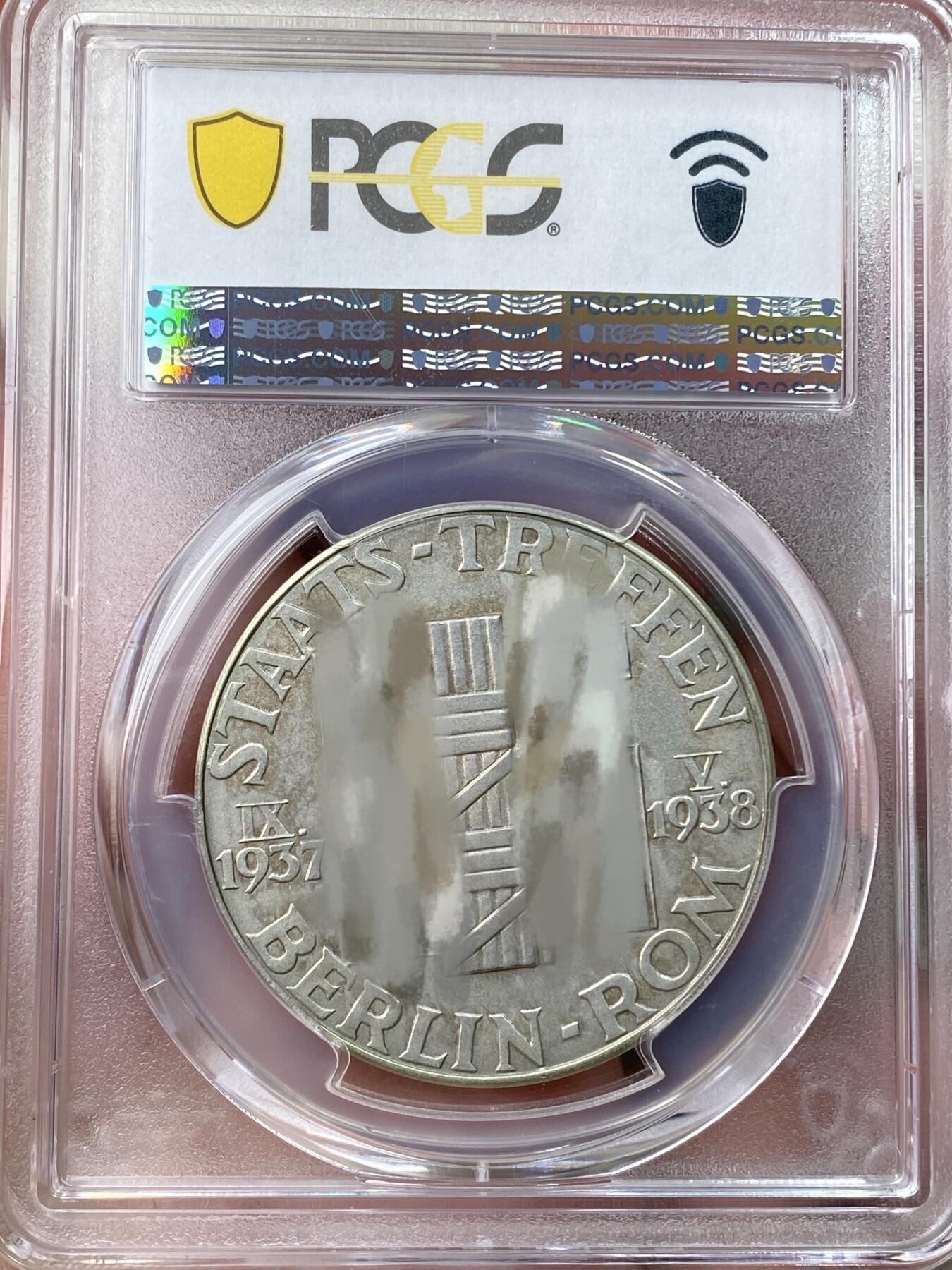 万国钱币拍卖第055期 PCGS SP62 1938年德国民族社会主义工人党党魁和墨索里尼互访首都纪念银章 双方在会面后组成著名的“钢铁同盟”原味磨砂淡彩（原图请私信后台或自行查询官网）