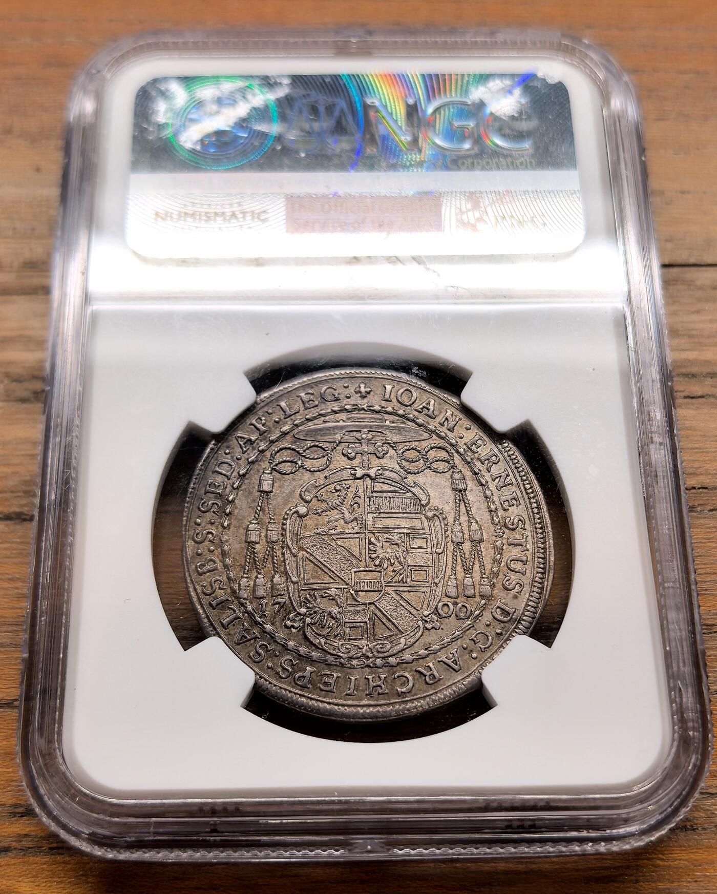 泉海漫舟·凡希社世界钱币微拍第三百十四期 1700萨尔茨堡主教区双圣图1/2泰勒NGC-MS63，传世包浆，压铸细节堪称完美，半泰勒好品稀少！