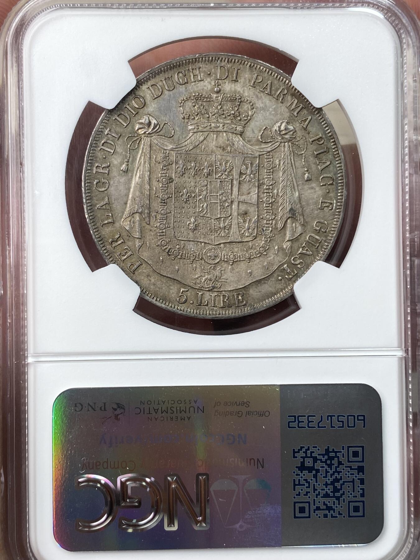 万国钱币拍卖第055期 NGC MS63 1815年意大利帕尔马5里拉银币 正面肖像为拿皇夫人，著名的帕尔马女大公玛丽亚·露易丝，背面是繁复华丽的帕尔马公国纹章，双面均匀欧陆五彩，国际市场广受欢迎的品种，好品也是越来越难见到，此等典藏级品质不可错过。