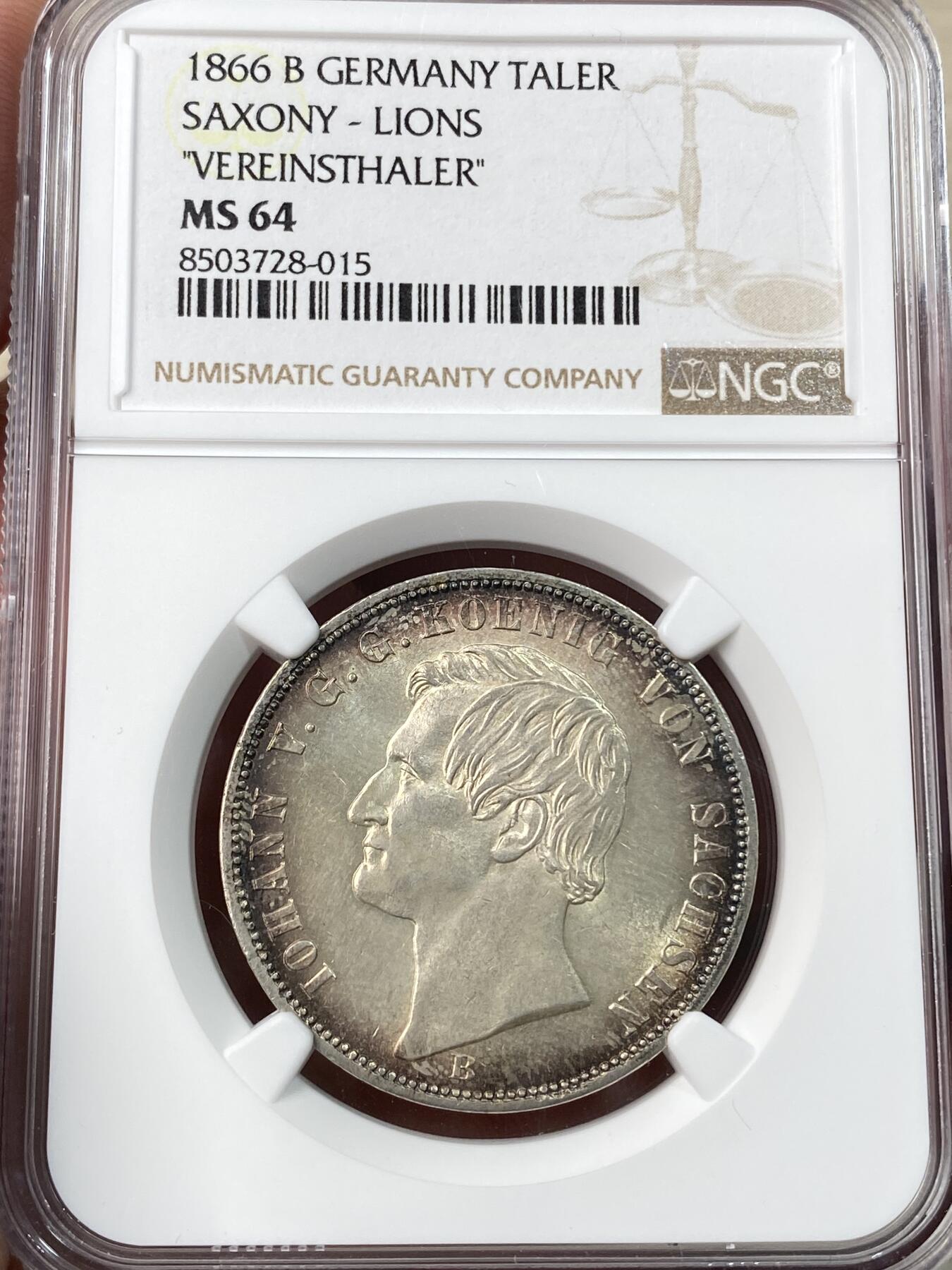 万国钱币拍卖第055期 NGC MS64 1866年德国萨克森双狮流通1泰勒 好品难得的流通品种 双狮护盾设计感满分 淡红色环彩转光近BU状态 顶级收藏品质