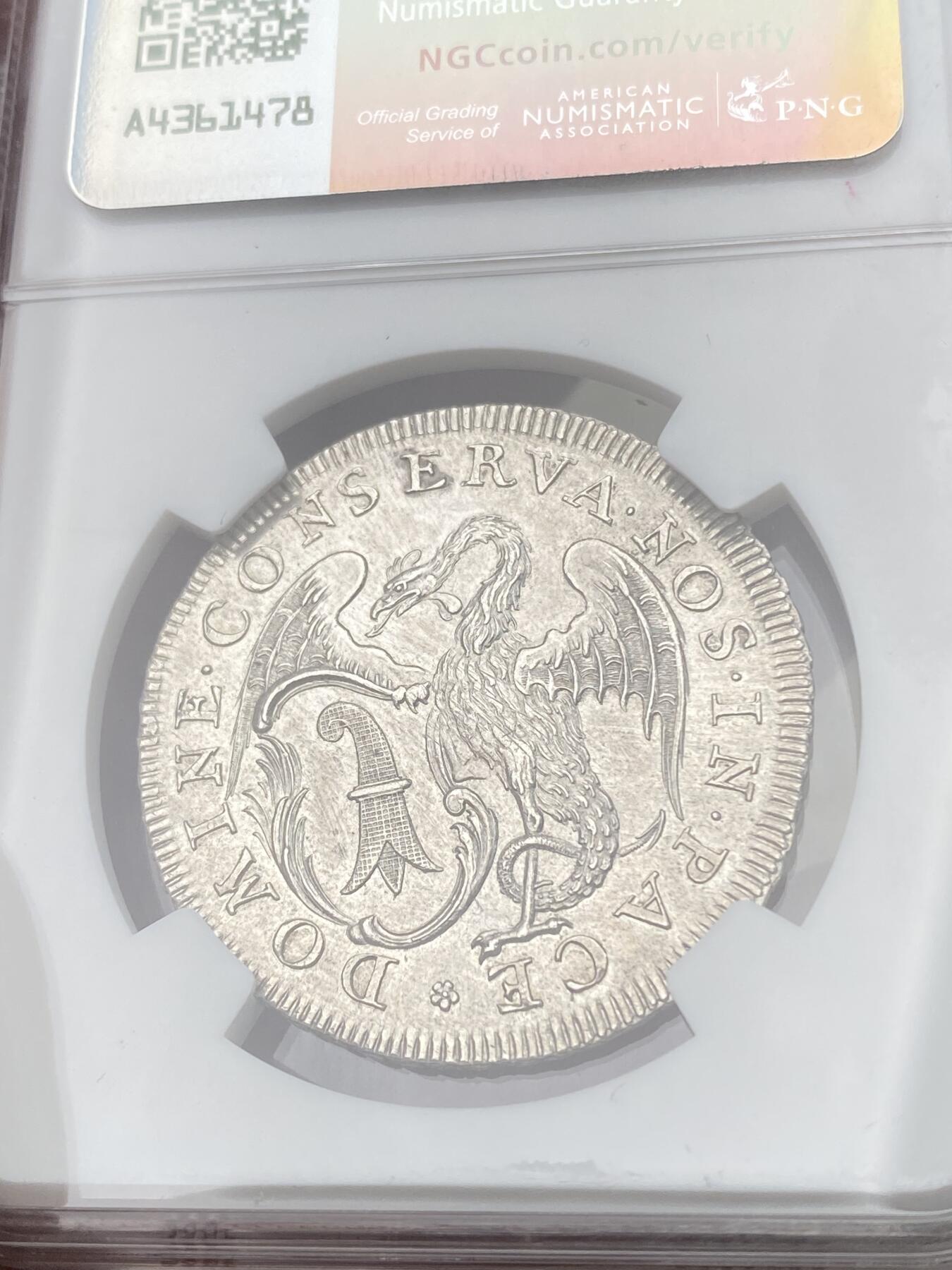 万国钱币拍卖第055期 NGC MS63 1740年瑞士巴塞尔景观1/2半泰勒 经典瑞士景观品种 银霜全深打极其难得 巴塞尔怪兽巴西利斯克身上的鳞片粒粒可数 城市细节一览无余 顶级收藏状态