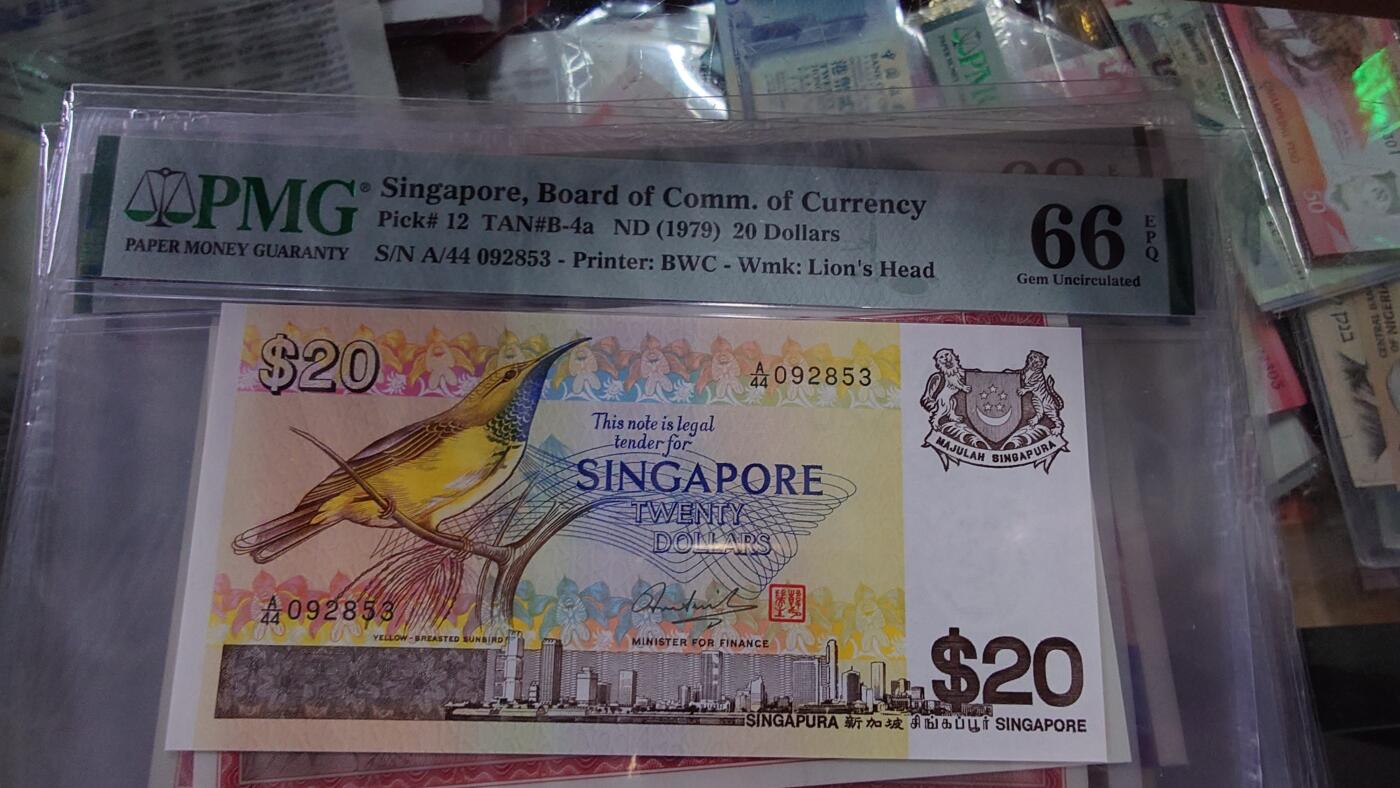 世界钱币～微拍第215期暨2025年第55期  双11评级币特惠拍第二场 1979年新加坡鸟版20元 无47 PMG66E