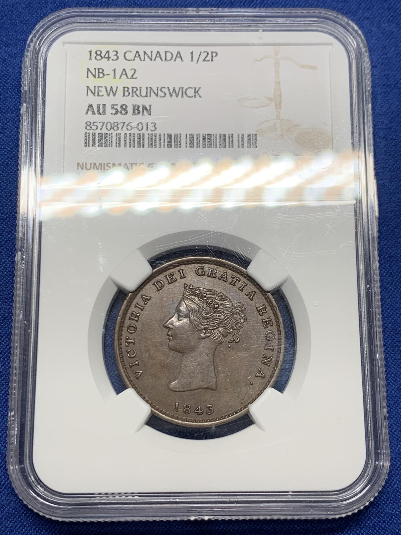 《竞宝斋》第438场 周日，周一，周二 3场连拍 （全场包邮） NGC AU58BN 加拿大1843年不伦瑞克半便士，细节不错，少见品种，目录价高，58已经难得