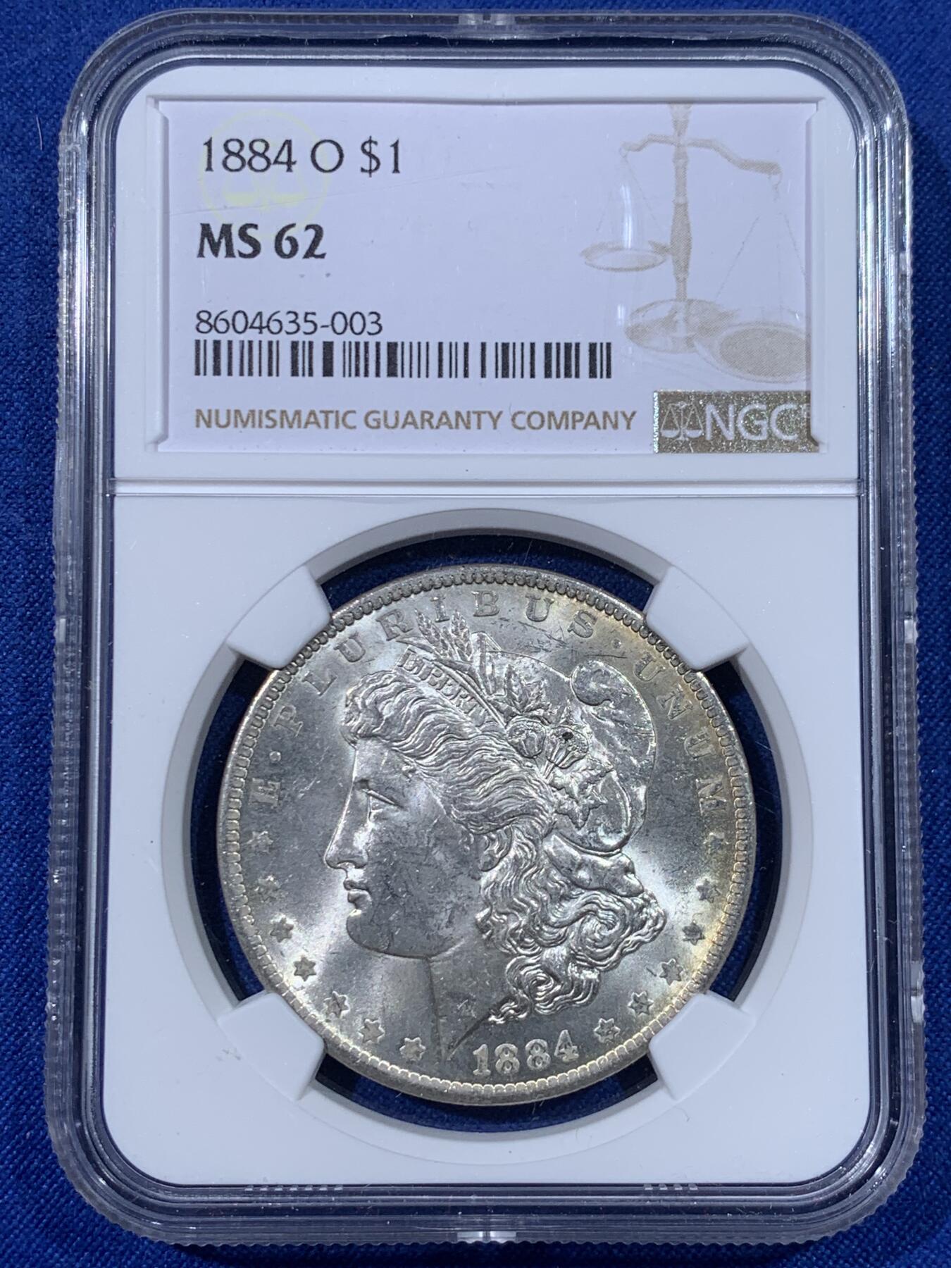 《竞宝斋》第438场 周日，周一，周二 3场连拍 （全场包邮） NGC MS62 美国1884年摩根1美元银币 边缘环彩 包浆很不错 银价高涨 通货裸币逼近300 62分算是超值的选择!