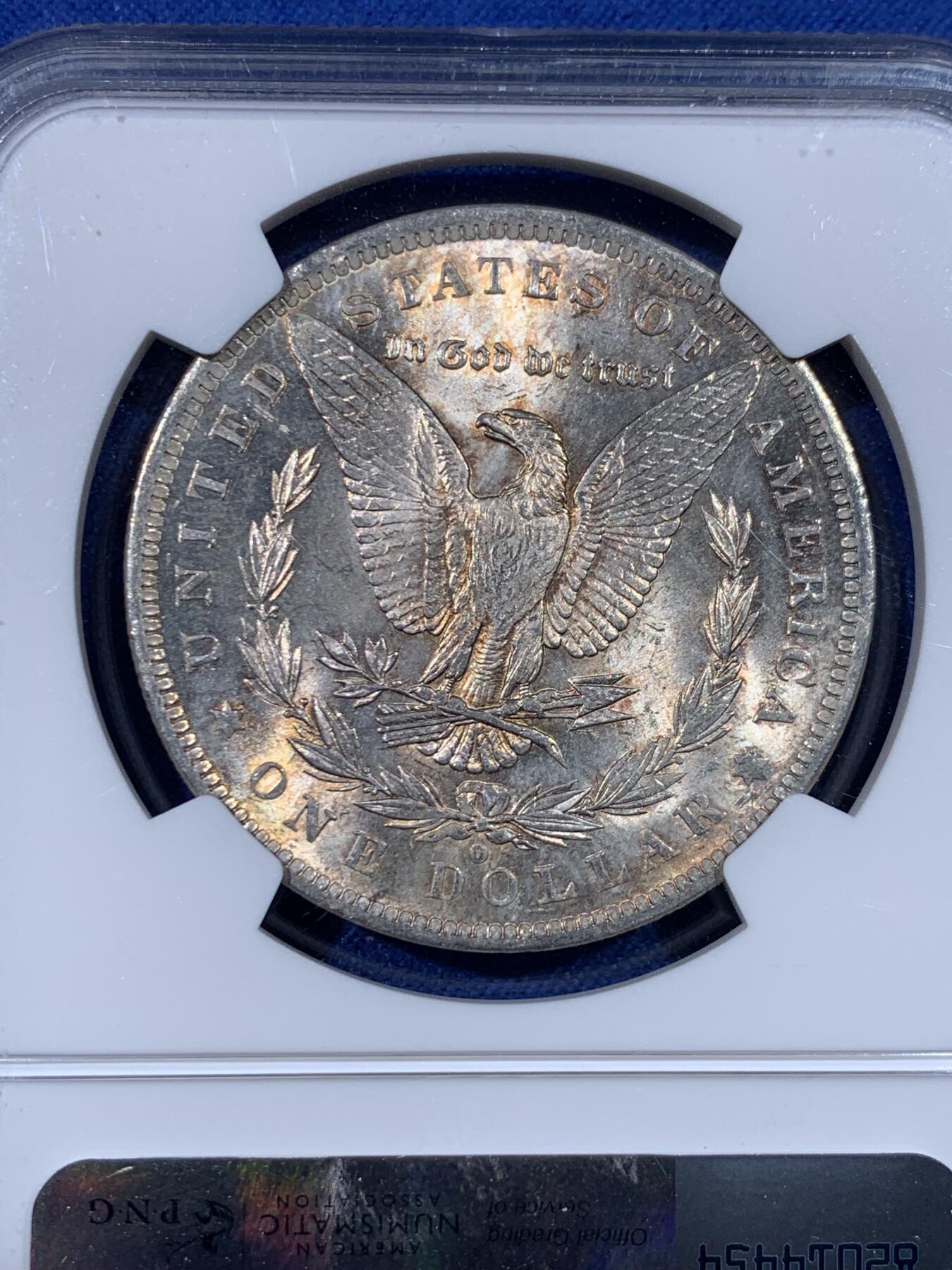 《竞宝斋》第438场 周日，周一，周二 3场连拍 （全场包邮） NGC MS62 美国1884年摩根1美元银币 边缘环彩 包浆很不错 银价高涨 通货裸币逼近300 62分算是超值的选择!