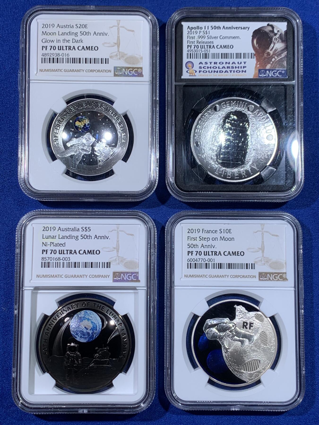 《竞宝斋》第438场 周日，周一，周二 3场连拍 （全场包邮） 四枚一组 NGC PF70UC 2019年登月50周年银币 美国阿波罗11号1美元精制纪念银币 黑盒 首期（克劳斯2021年世界硬币大赛最佳时事币，26.73克重，999纯银，币径38.1MM）+ 法国彩色树脂双面镶嵌10欧精制纪念银币（17.3克900银，币径37MM，限量5千枚）+ 奥地利夜光荧映20欧精制纪念银币（22.4克重，925银，币径34MM，限量发行3万枚，盒证齐全）+ 澳大利亚阿