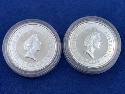 《竞宝斋》第438场 周日，周一，周二 3场连拍 （全场包邮） 两枚一组 澳大利亚 1997年 笑翠鸟 熊猫镶嵌银币 每枚含纯银1盎司999银，镶嵌部分重约0.5克黄金，发行1.5万枚，为上海国际钱币展而发行，细节见图。