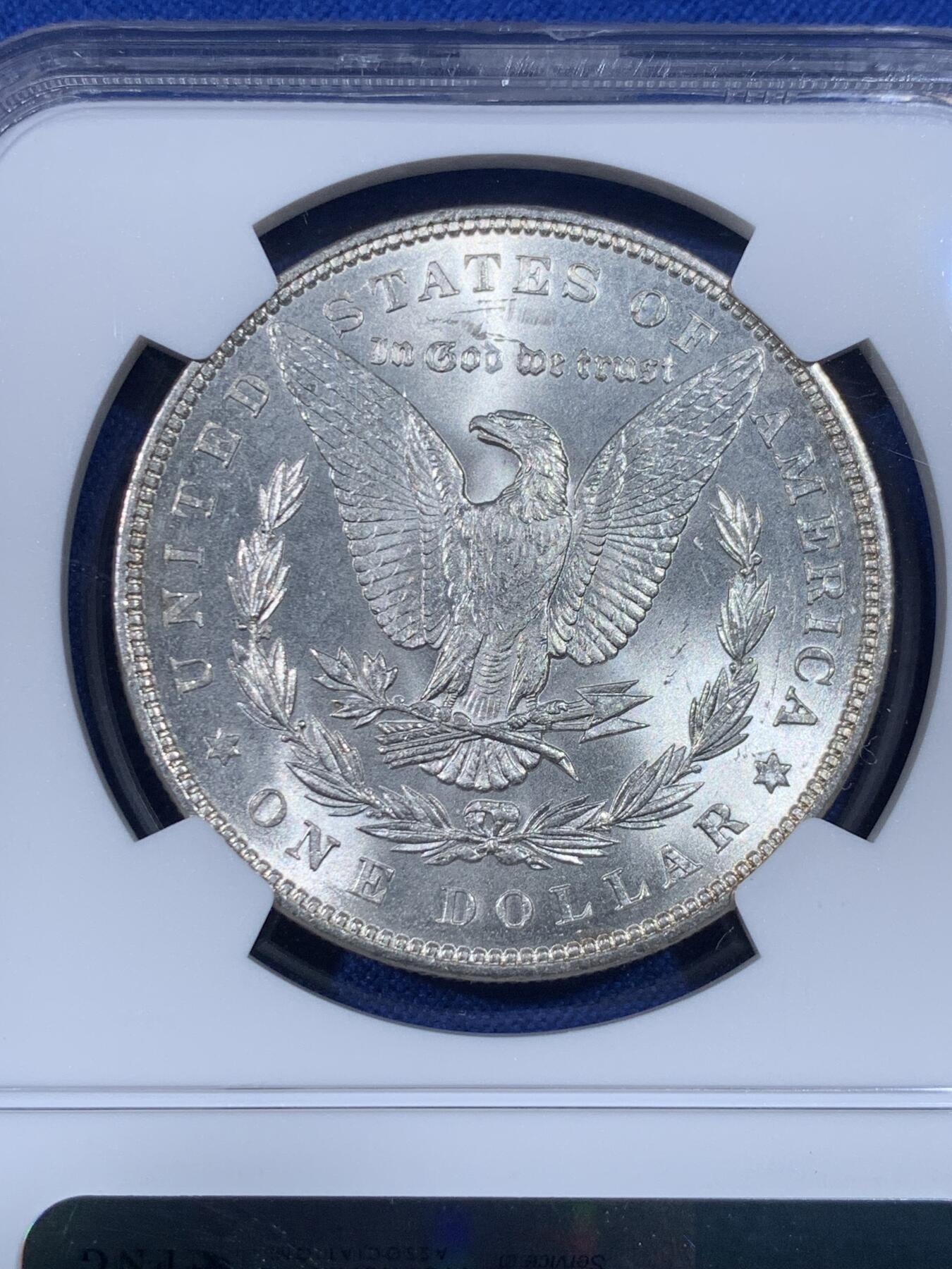 《竞宝斋》第438场 周日，周一，周二 3场连拍 （全场包邮） NGC MS63 美国1887年摩根银币 趣味包浆彩，有一定把玩性，比较特殊。