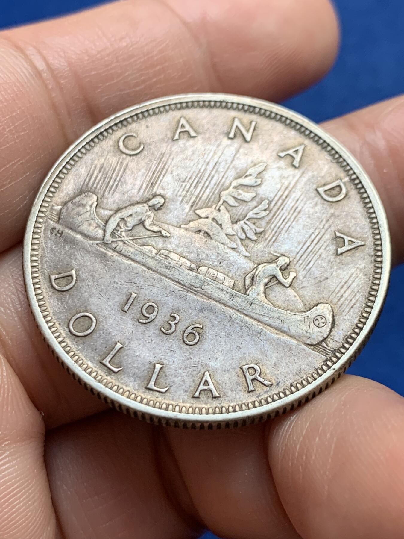 《竞宝斋》第438场 周日，周一，周二 3场连拍 （全场包邮） 加拿大1936年独木舟一元银币 乔治五世头像，加拿大早期划船银币，品相包浆状态都很好