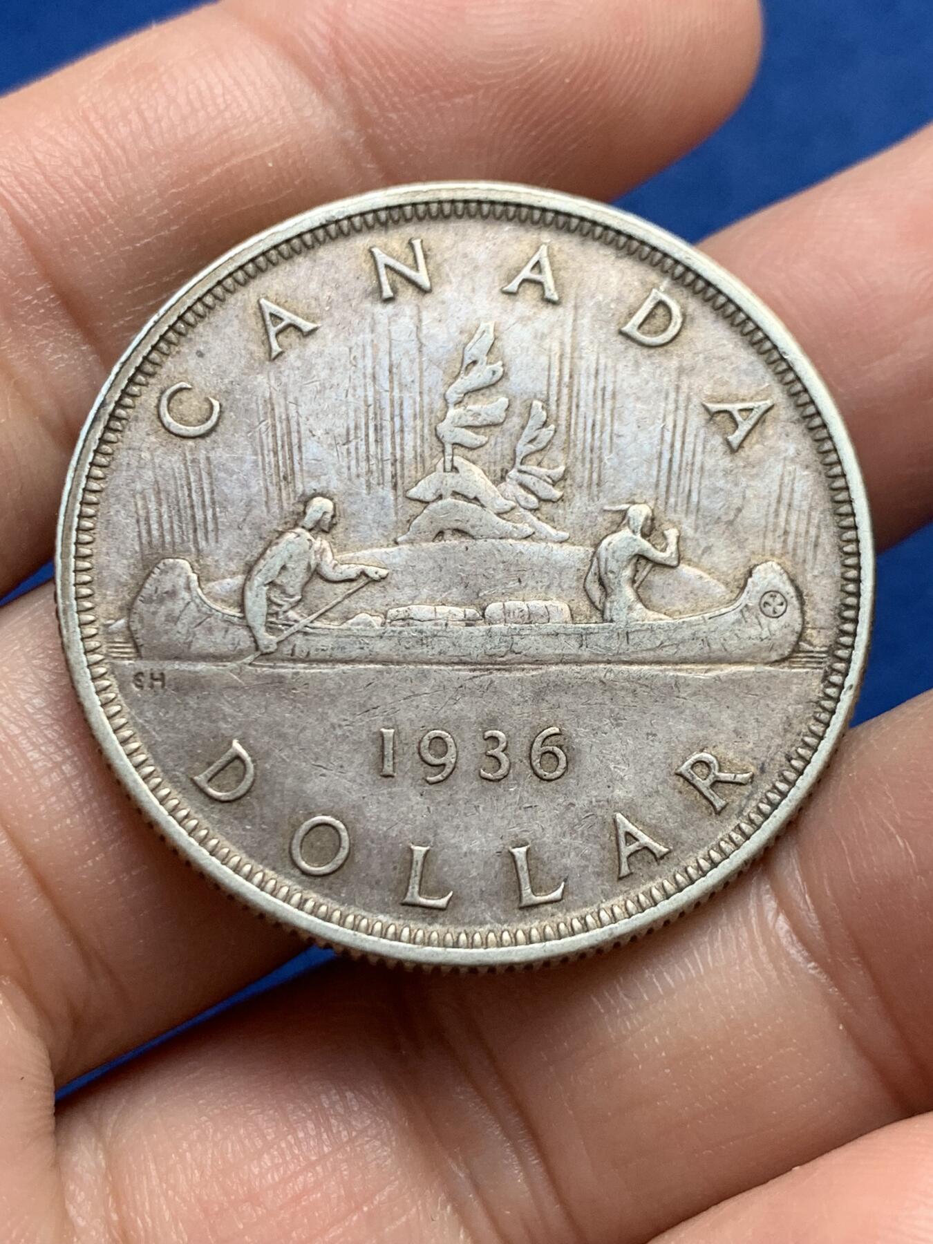 《竞宝斋》第438场 周日，周一，周二 3场连拍 （全场包邮） 加拿大1936年独木舟一元银币 乔治五世头像，加拿大早期划船银币，品相包浆状态都很好