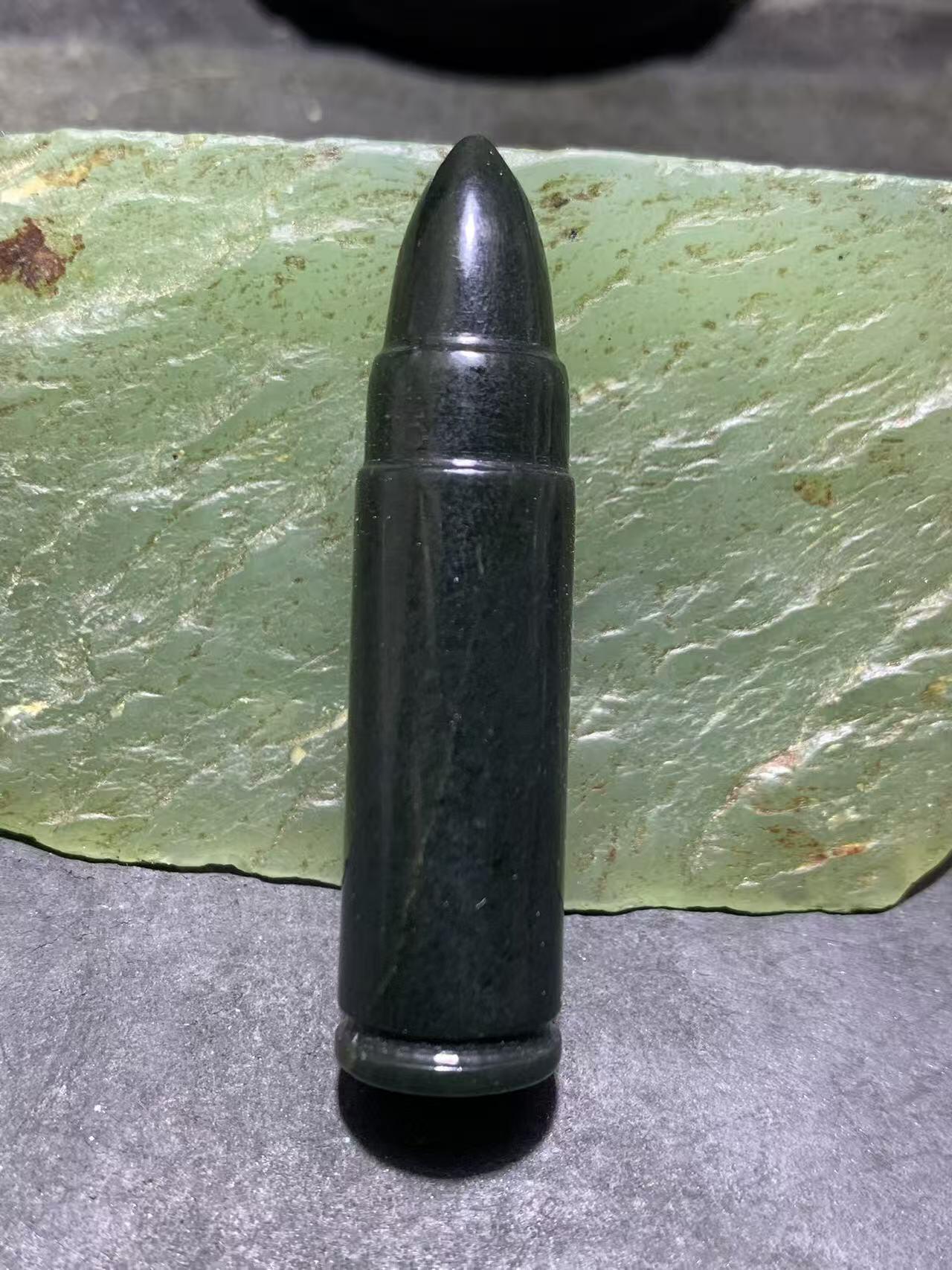 天然新疆和田青玉子 弹通货吊坠1颗，