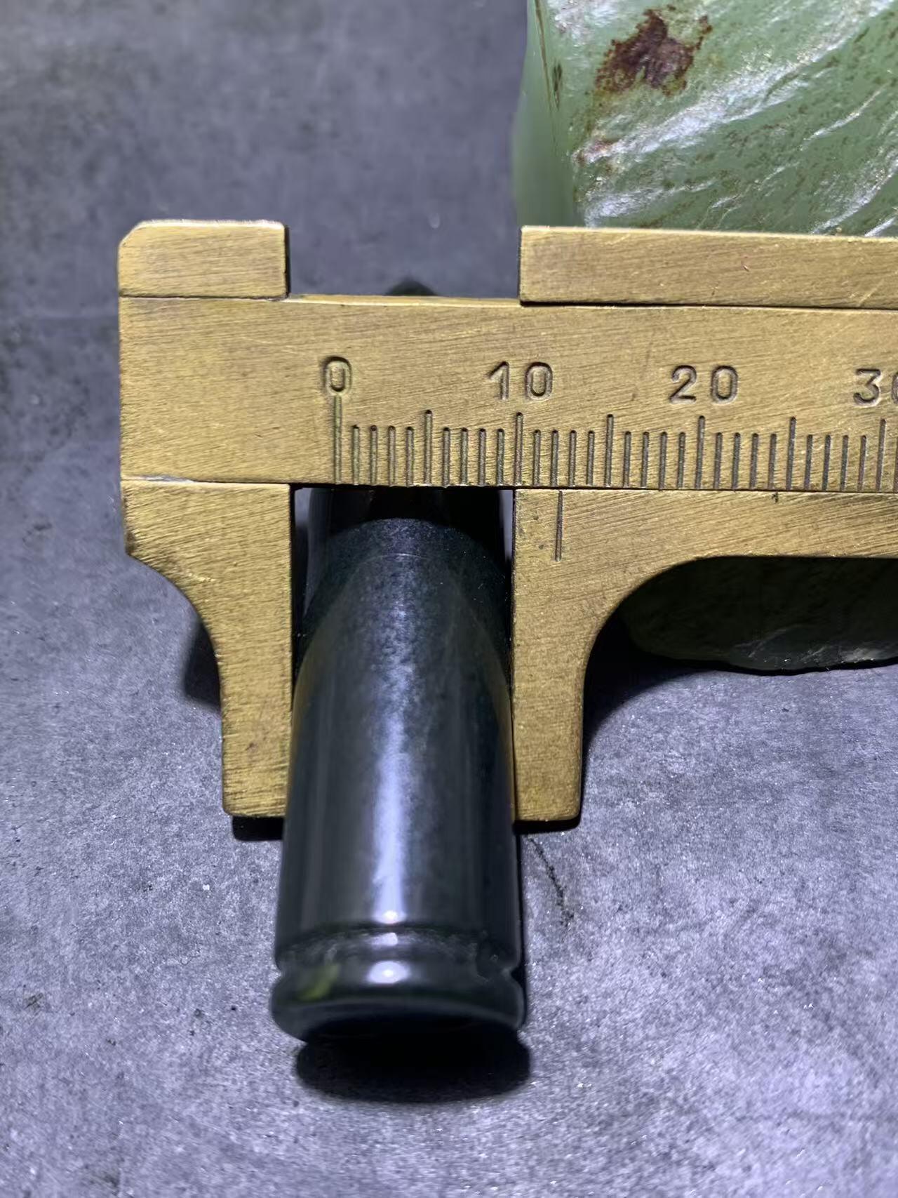 天然新疆和田青玉子 弹通货吊坠1颗，