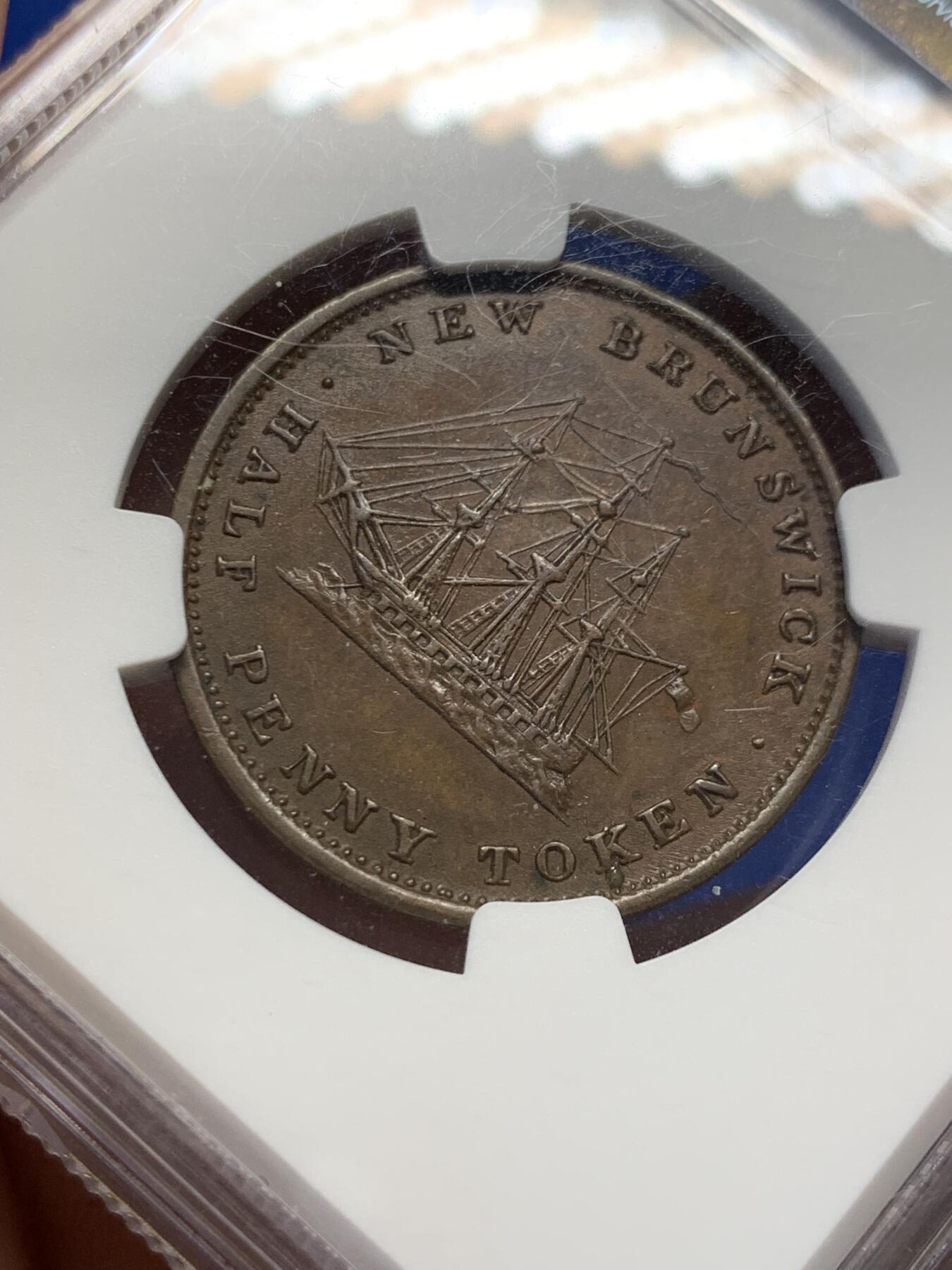 《竞宝斋》第438场 周日，周一，周二 3场连拍 （全场包邮） NGC AU58BN 加拿大1843年不伦瑞克半便士，细节不错，少见品种，目录价高，58已经难得