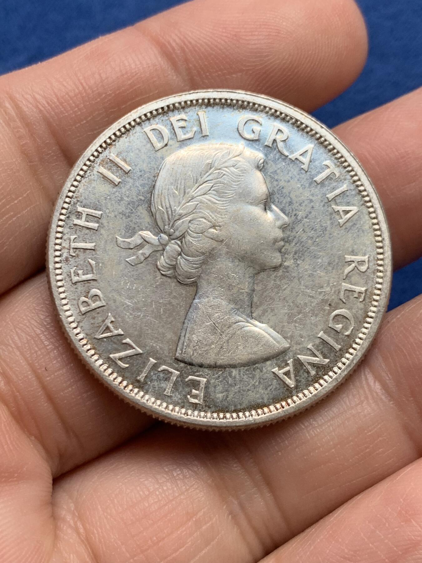 《竞宝斋》第438场 周日，周一，周二 3场连拍 （全场包邮） 加拿大1963年伊丽莎白二世划船1加元银币