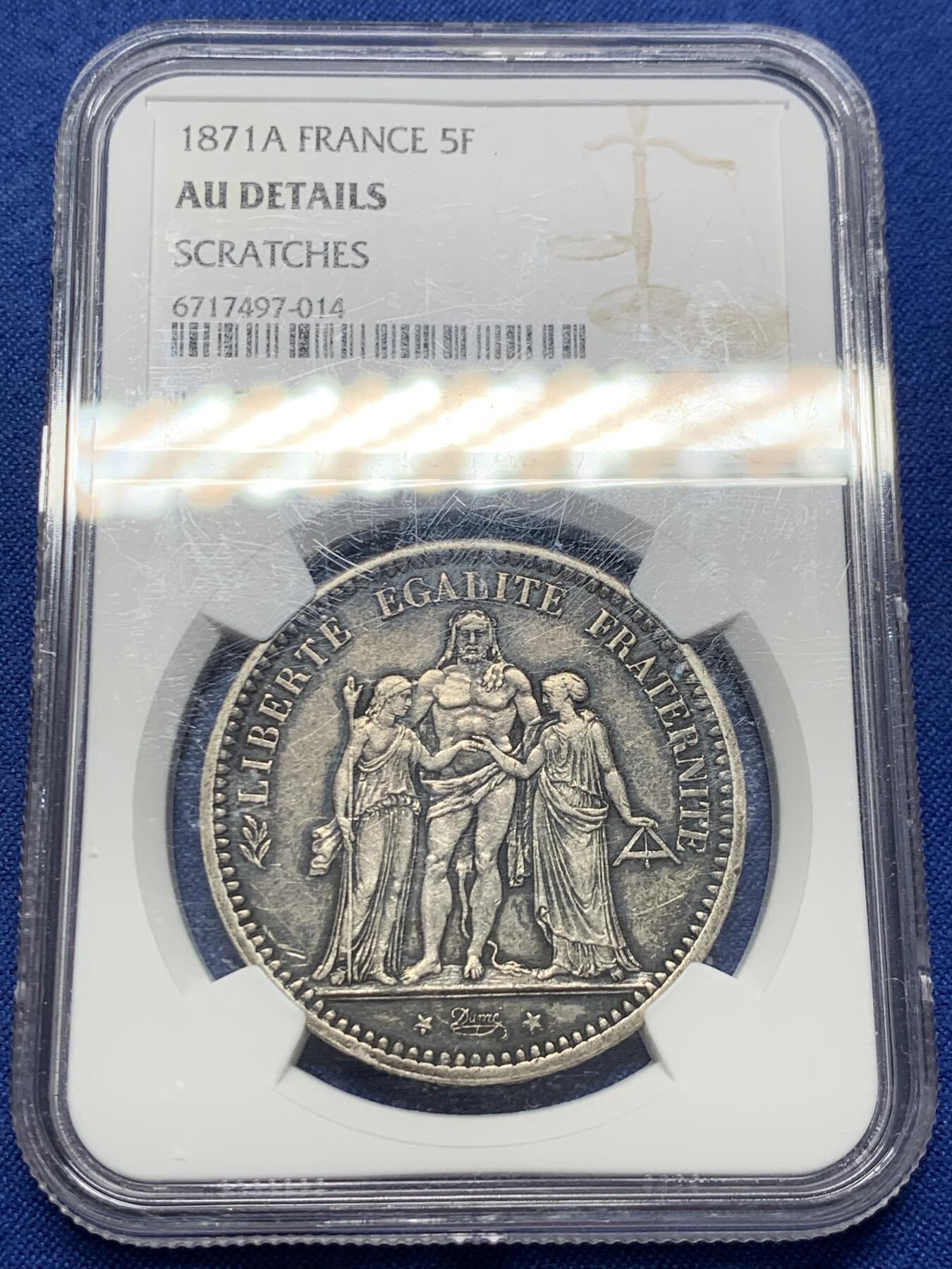 《竞宝斋》第438场 周日，周一，周二 3场连拍 （全场包邮） NGC AUD 法国1871年5法郎大力神银币，大特年名誉品，巴黎公社三叉戟厂标（71有间隔版），同品种22年HA外拍62分成交价1620美元