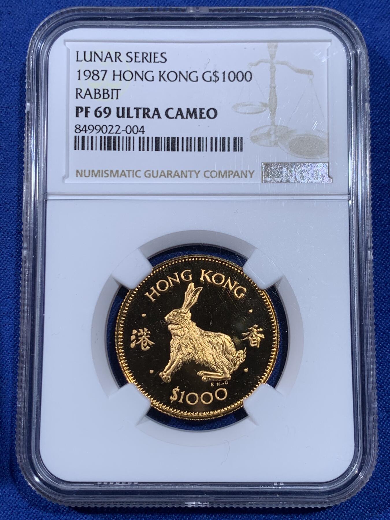 《竞宝斋》第438场 周日，周一，周二 3场连拍 （全场包邮） NGC PF69UC 1987香港兔年精制千元生肖金币 英国皇家造币厂原盒带证书 精美高浮雕 15.98克 917金 proof版发行较少 黄金继续强势保值抗险