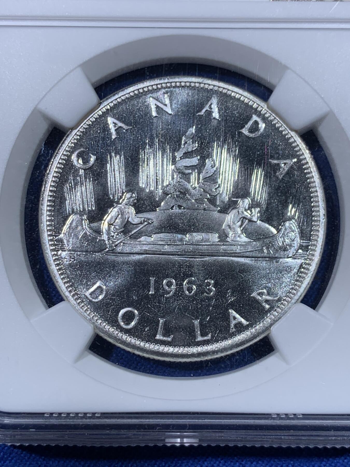 《竞宝斋》第438场 周日，周一，周二 3场连拍 （全场包邮） NGC PL66 加拿大1963年小伊1元划船大银币，飘带青年头像伊伊，年轻头像的关门年份，比中年版少见太多。品相极佳，PL状态超群