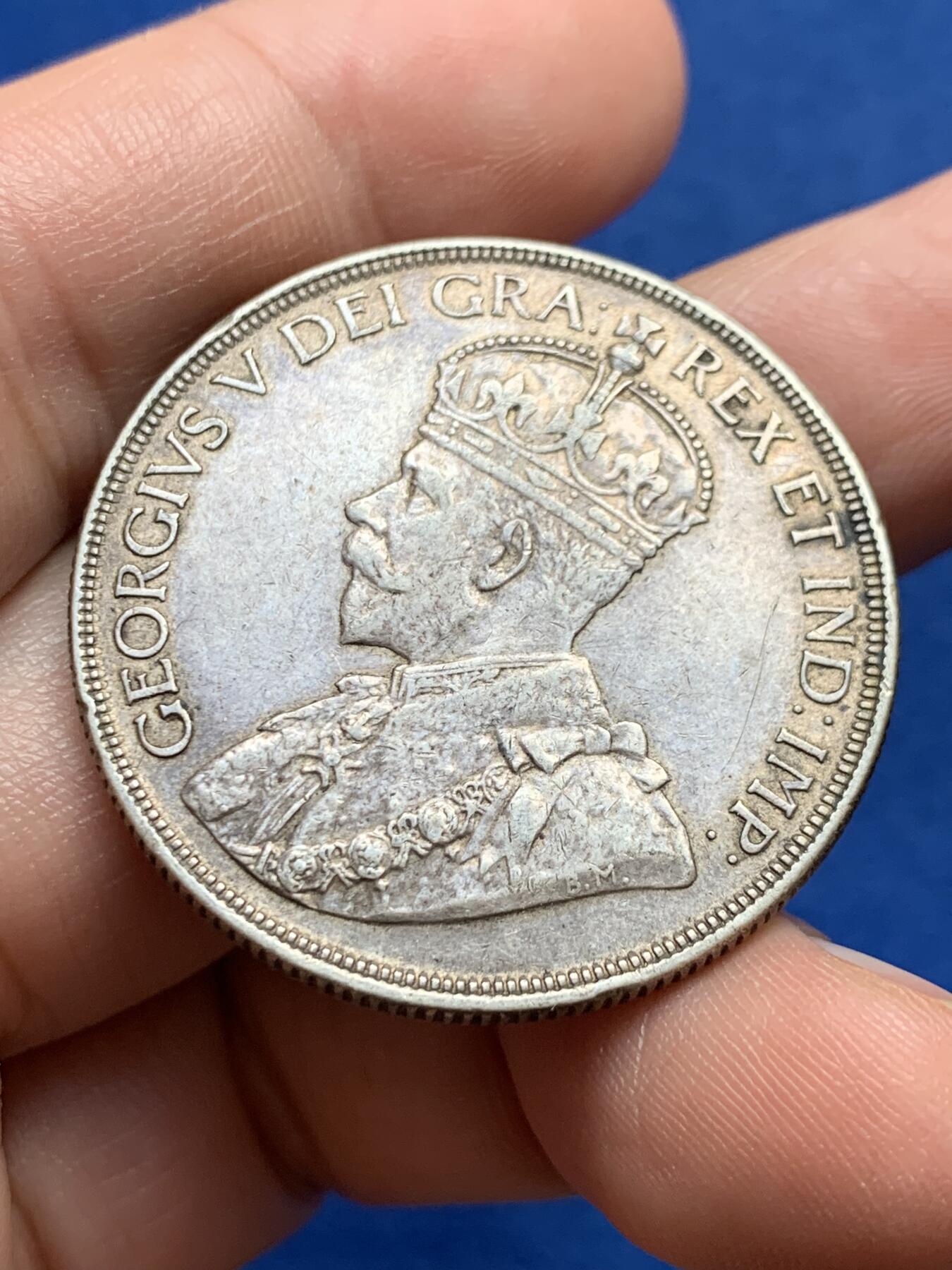 《竞宝斋》第438场 周日，周一，周二 3场连拍 （全场包邮） 加拿大1936年独木舟一元银币 乔治五世头像，加拿大早期划船银币，品相包浆状态都很好