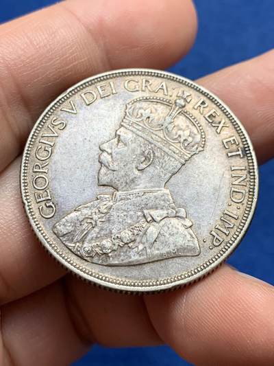 《竞宝斋》第438场 周日，周一，周二 3场连拍 （全场包邮） 加拿大1936年独木舟一元银币 乔治五世头像，加拿大早期划船银币，品相包浆状态都很好