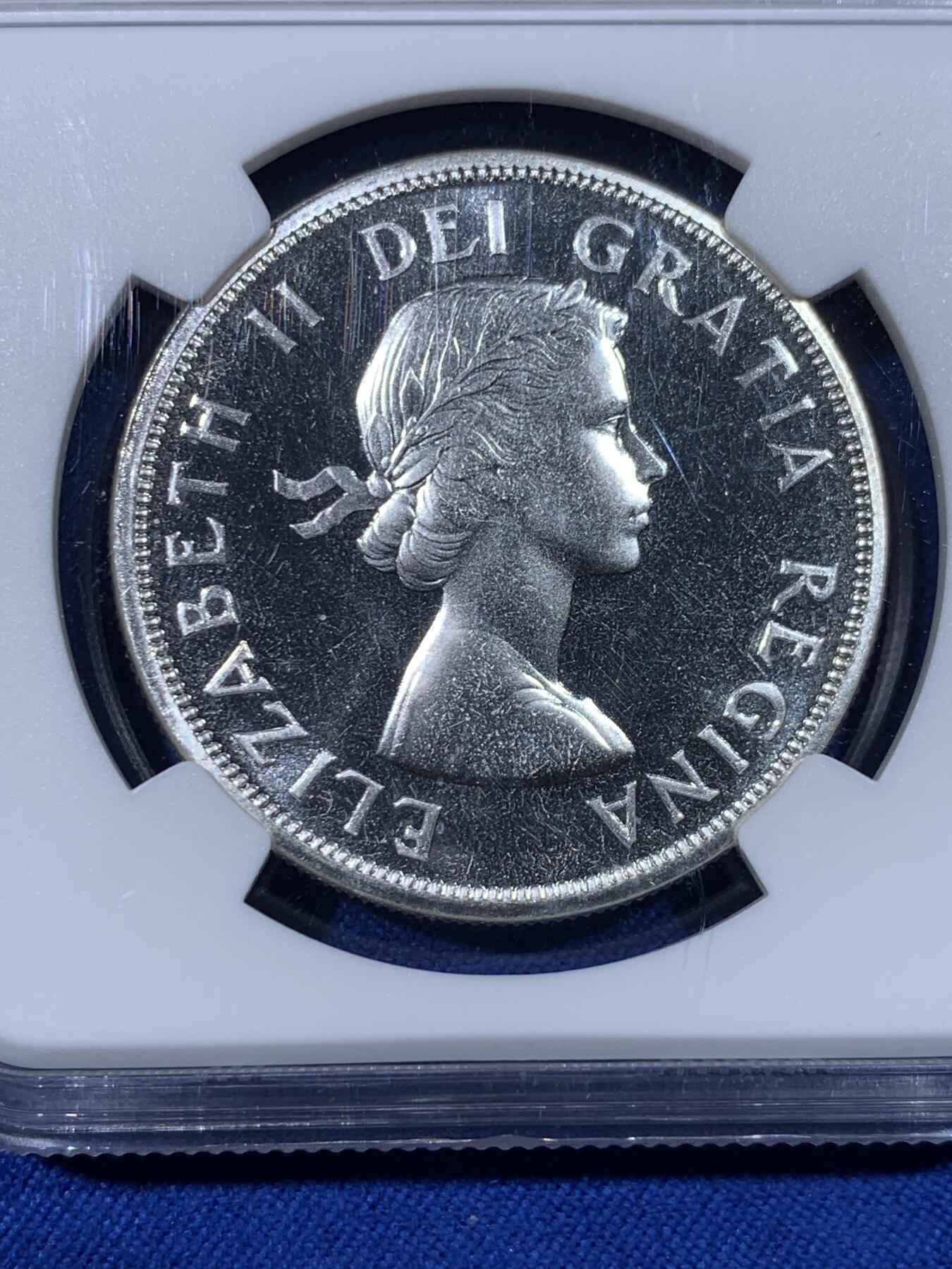 《竞宝斋》第438场 周日，周一，周二 3场连拍 （全场包邮） NGC PL66 加拿大1963年小伊1元划船大银币，飘带青年头像伊伊，年轻头像的关门年份，比中年版少见太多。品相极佳，PL状态超群