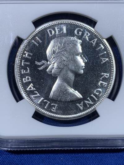 《竞宝斋》第438场 周日，周一，周二 3场连拍 （全场包邮） NGC PL66 加拿大1963年小伊1元划船大银币，飘带青年头像伊伊，年轻头像的关门年份，比中年版少见太多。品相极佳，PL状态超群