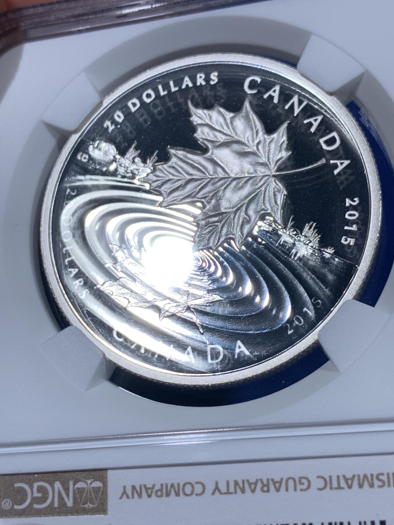 《竞宝斋》第438场 周日，周一，周二 3场连拍 （全场包邮） NGC PF69UC 加拿大2015年水滴幻影枫叶20加元精制银币（最美的枫叶币之一，水滴涟漪采取镜面喷砂工艺，栩栩如生！1盎司克重，9999纯银，币径38MM，限量发行8500枚，盒证齐全）