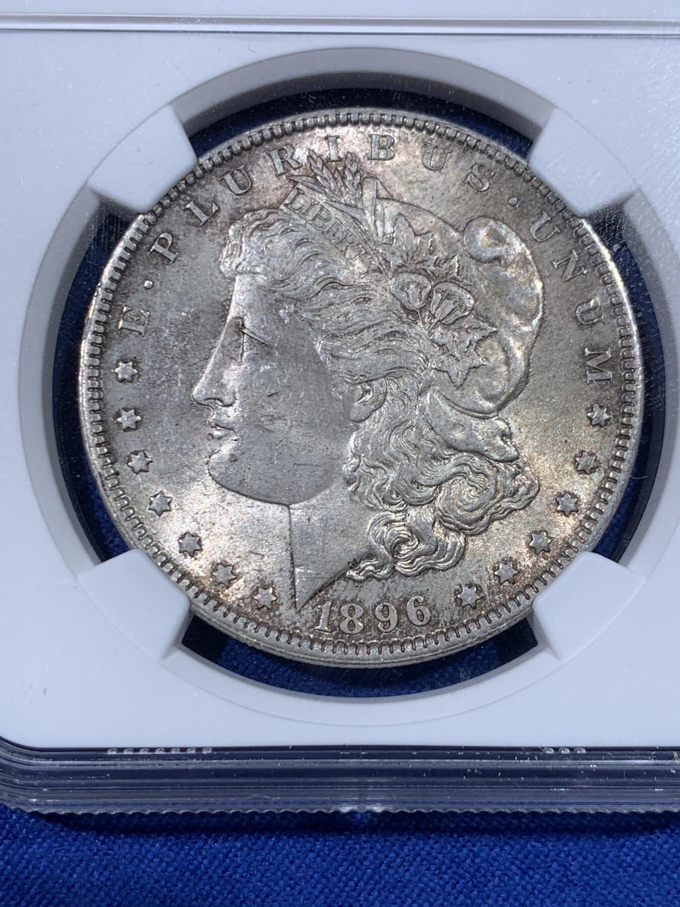 《竞宝斋》第438场 周日，周一，周二 3场连拍 （全场包邮） NGC MS64 美国1896年摩根银币，双面自然包浆，光度好。