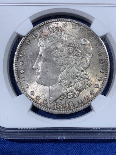 《竞宝斋》第438场 周日，周一，周二 3场连拍 （全场包邮） NGC MS64 美国1896年摩根银币，双面自然包浆，光度好。