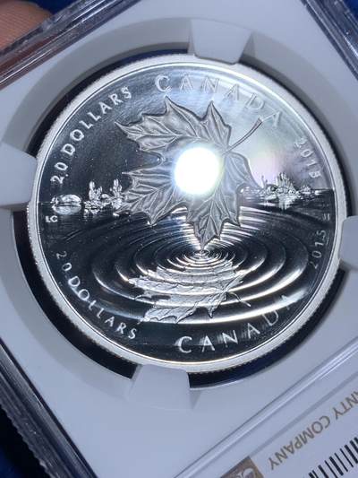 《竞宝斋》第438场 周日，周一，周二 3场连拍 （全场包邮） NGC PF69UC 加拿大2015年水滴幻影枫叶20加元精制银币（最美的枫叶币之一，水滴涟漪采取镜面喷砂工艺，栩栩如生！1盎司克重，9999纯银，币径38MM，限量发行8500枚，盒证齐全）