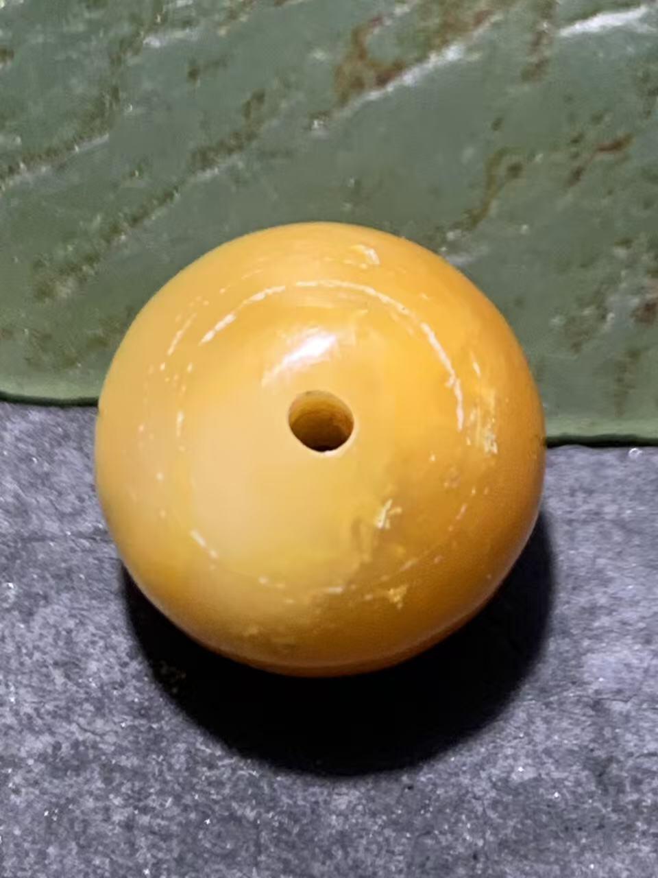 高玉化缅甸黄玉通货老形桶珠一颗！