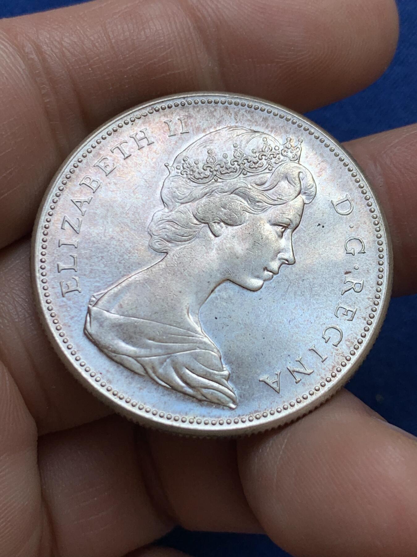 《竞宝斋》第439场 周日，周一，周二 3场连拍 （全场包邮） 加拿大1967年建国100周年大雁银币 强转光 品相很好，女王面淡紫彩