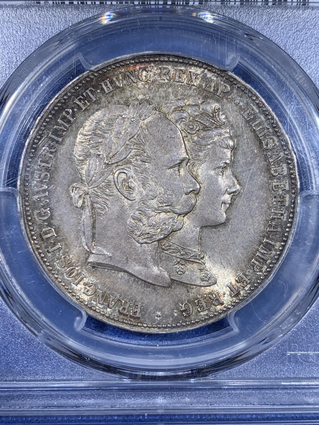 《竞宝斋》第439场 周日，周一，周二 3场连拍 （全场包邮） PCGS MS64 奥地利1879年弗朗茨与茜茜公主银婚2FL大银币，热门品种。环彩包浆，底板光彩潋滟，丝滑无瑕 状态太好，实物绝赞