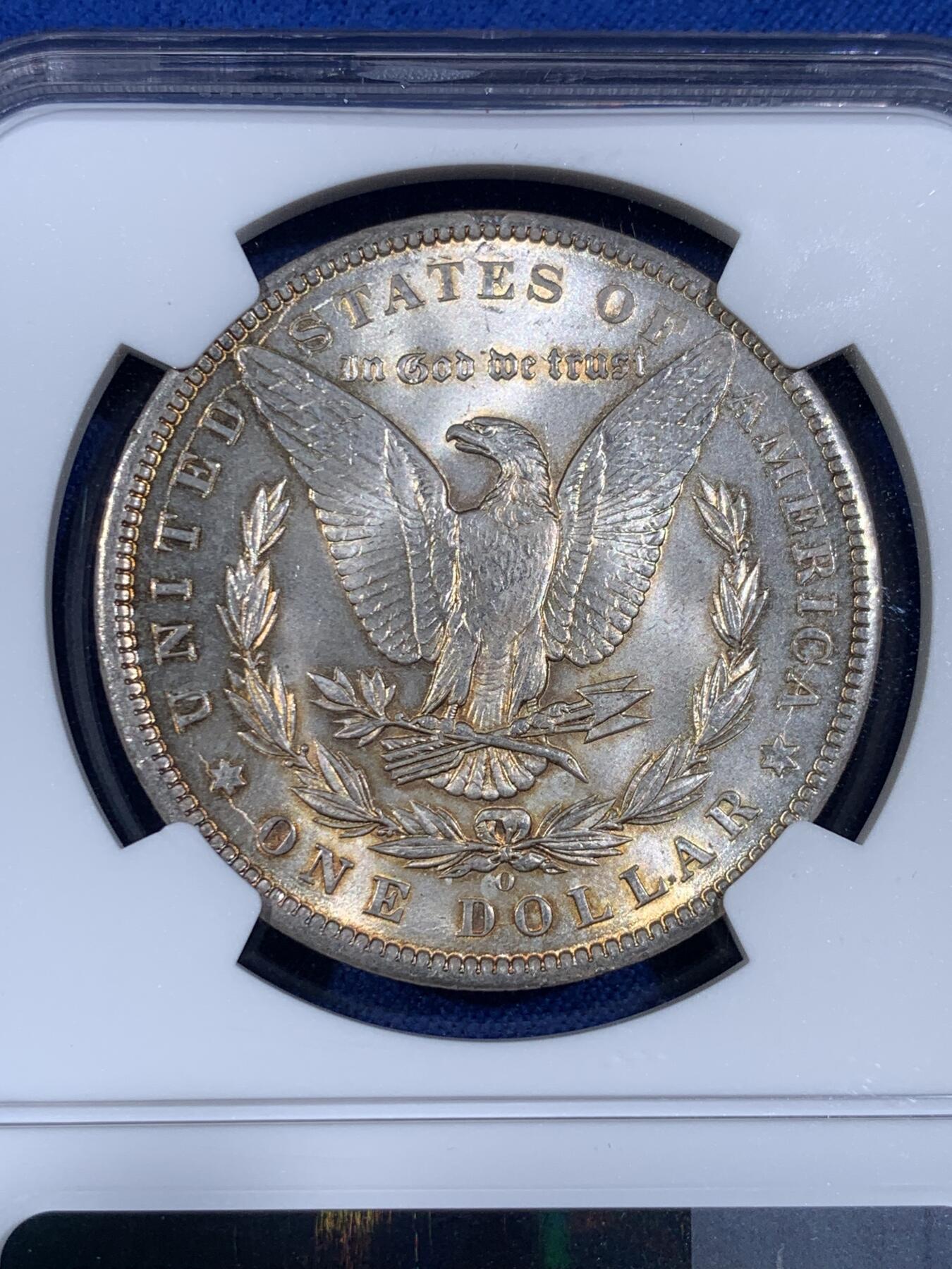 《竞宝斋》第439场 周日，周一，周二 3场连拍 （全场包邮） NGC MS63 美国1899年摩根银币O版 正反都有淡金彩包浆 不太常见的年份