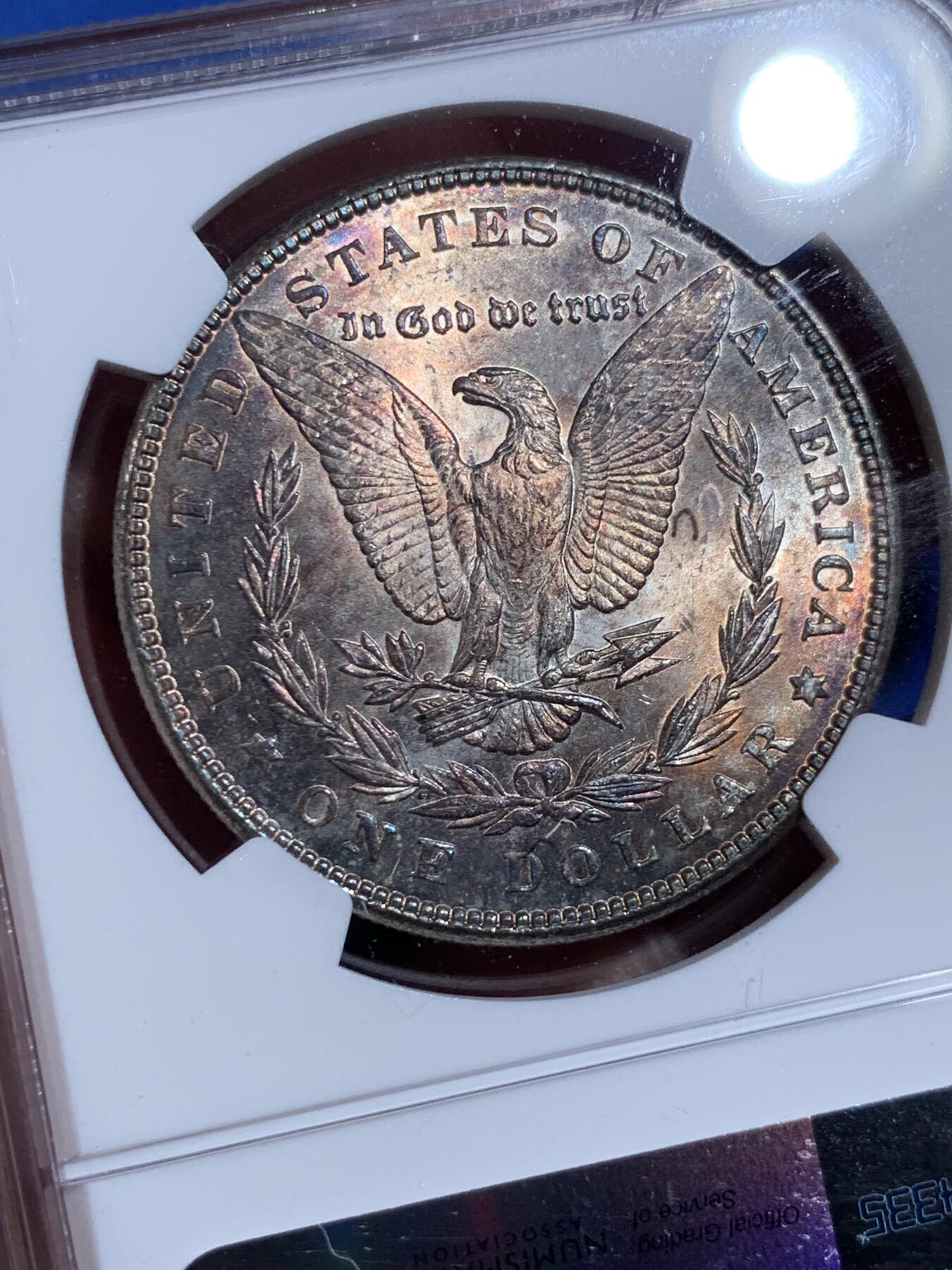 《竞宝斋》第439场 周日，周一，周二 3场连拍 （全场包邮） NGC MS63 美国1898年摩根银币P版，原汁原味五彩老包浆，转光强烈细节优秀。