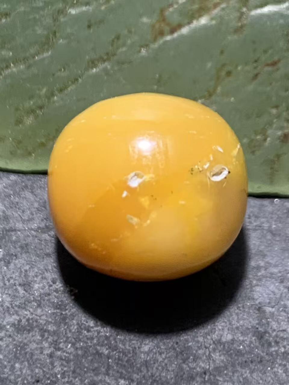 高玉化缅甸黄玉通货老形桶珠一颗！