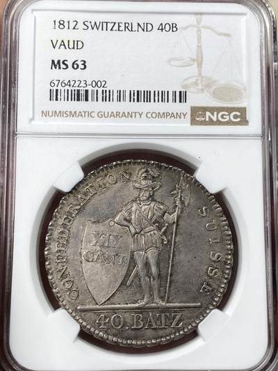 万国钱币拍卖第055期 - NGC MS63 1812年瑞士沃德州雇佣兵40巴增 著名的瑞邦雇佣兵系列，洛桑造币厂铸，发行量仅2485枚，双面均匀一色的原味包浆，高浮雕设计，人物细节淋漓尽致，瑞士价格多年未动，如此漂亮且稀少的大型主币绝对称得上是价格洼地了，此次贴脸入手机会切勿错过。