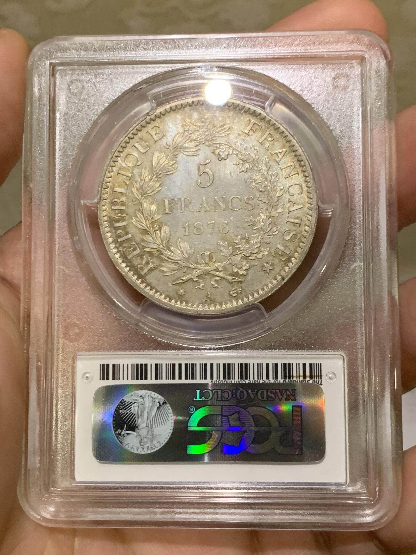 《竞宝斋》第439场 周日，周一，周二 3场连拍 （全场包邮） PCGS MS64＋ 法国第三共和国1876年大力神5法郎银币 类镜面底板 原光淡五彩 状态很不错