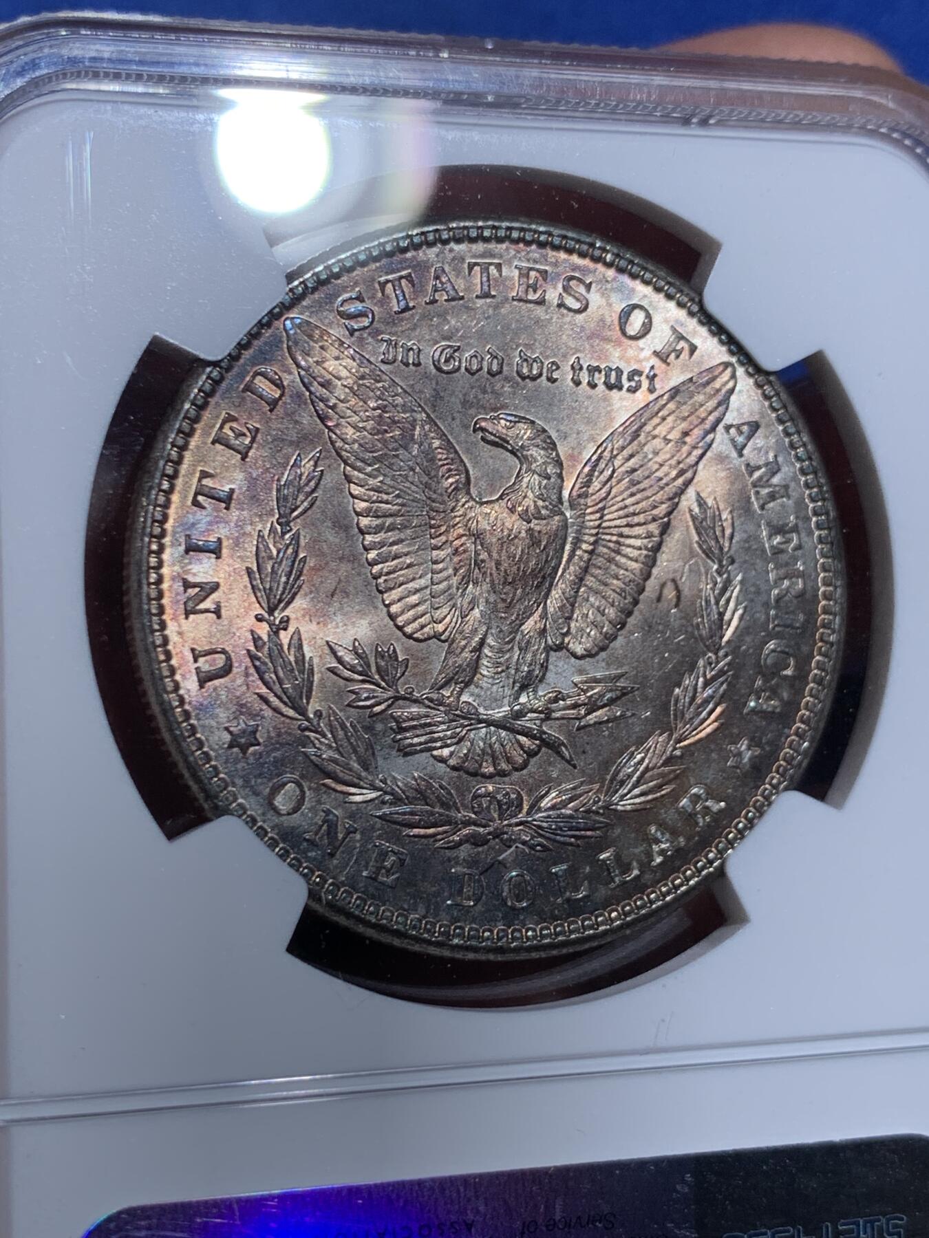 《竞宝斋》第439场 周日，周一，周二 3场连拍 （全场包邮） NGC MS63 美国1898年摩根银币P版，原汁原味五彩老包浆，转光强烈细节优秀。