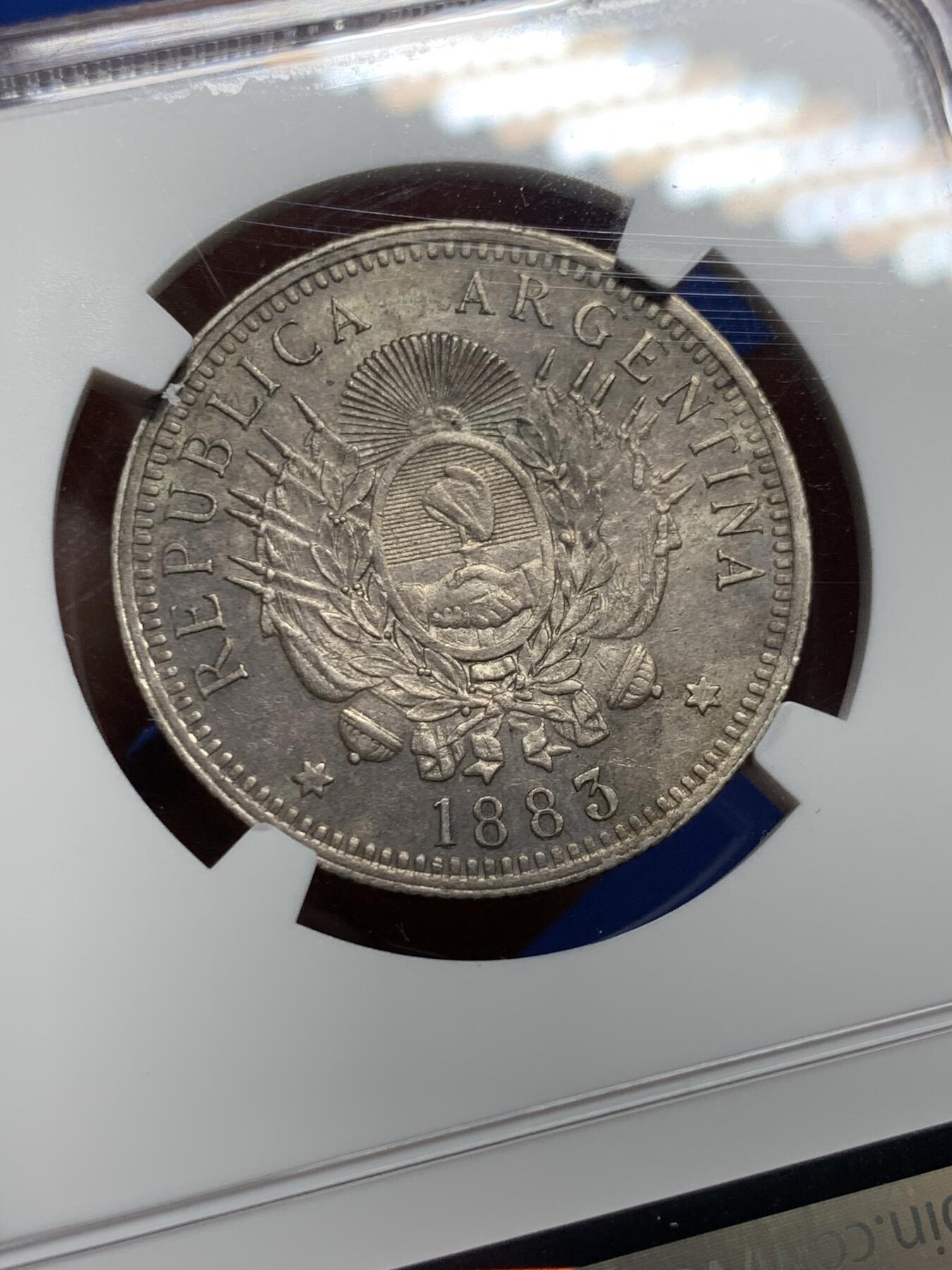 《竞宝斋》第439场 周日，周一，周二 3场连拍 （全场包邮） NGC AU58 阿根廷1883年自由女神50分银币 酱彩金五彩老黑包浆，深打有细节