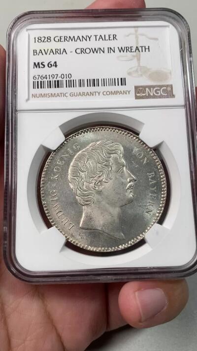 万国钱币拍卖第055期 NGC MS64 1828巴伐利亚路德维希一世皇冠流通大泰勒 流通极其充分的路一皇冠大泰勒 高分难得一见 顶级银霜丝绸转光 NGC唯一冠军分 