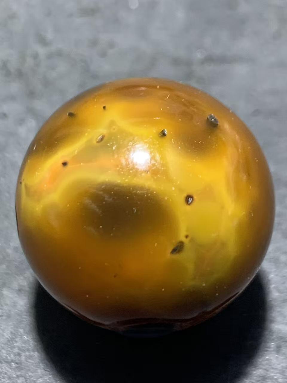 精美冻料原皮战国红玛瑙雕刻天眼图案圆珠一个