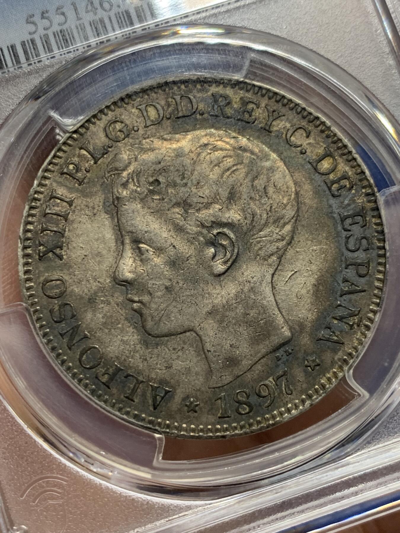《竞宝斋》第439场 周日，周一，周二 3场连拍 （全场包邮） PCGS XF45 西属菲律宾1897年1比索银币。此枚正反酱彩包浆状态极佳，仅发行一年的西属菲律宾唯一大银，有分都非常难得的品种，麦稀奇50分成交价多次超过3000。