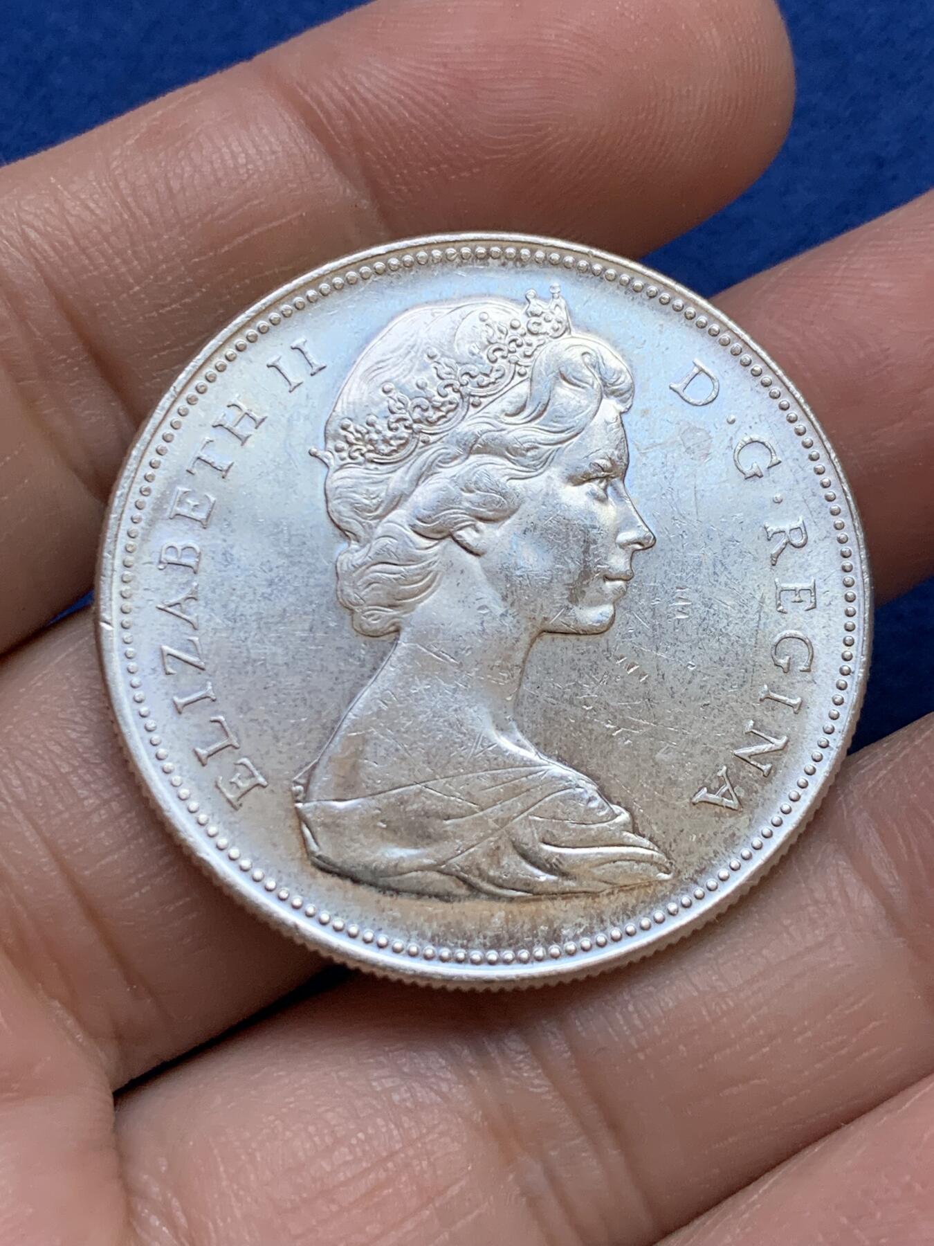 《竞宝斋》第439场 周日，周一，周二 3场连拍 （全场包邮） 加拿大1966年划船大银币 转光好品，底光充沛，经典独木舟，细节和状态都不错