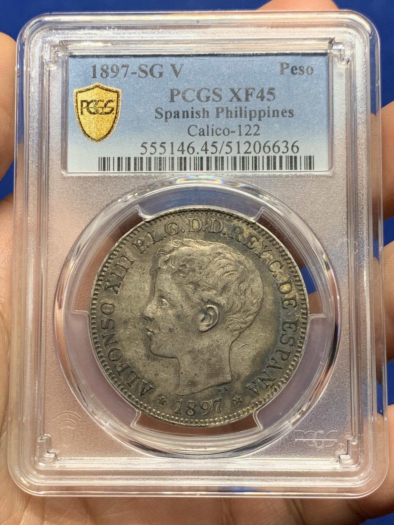 《竞宝斋》第439场 周日，周一，周二 3场连拍 （全场包邮） PCGS XF45 西属菲律宾1897年1比索银币。此枚正反酱彩包浆状态极佳，仅发行一年的西属菲律宾唯一大银，有分都非常难得的品种，麦稀奇50分成交价多次超过3000。