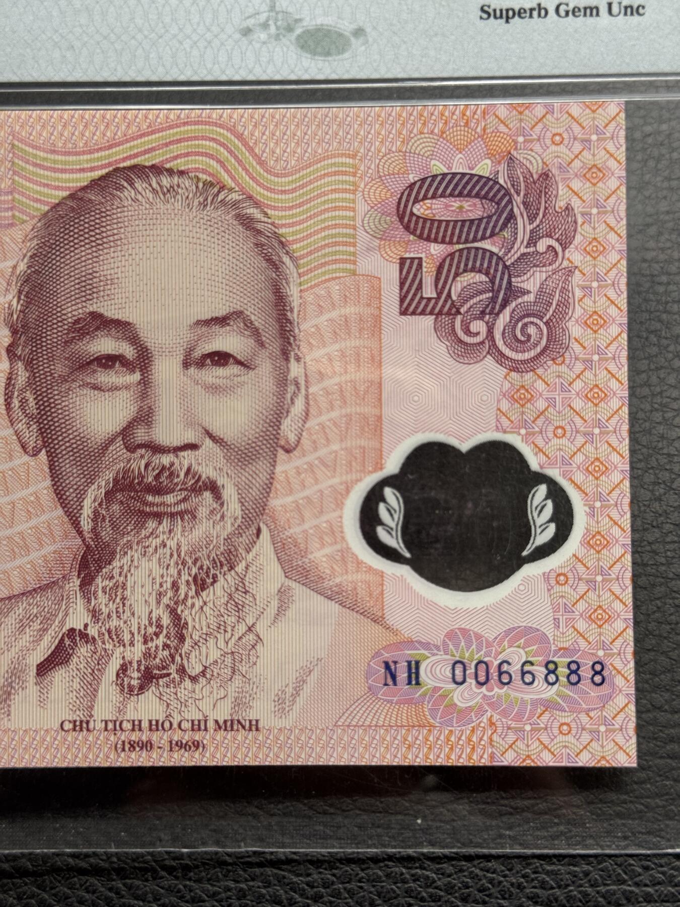 桂P钱币文化工作室拍卖第四十五期 越南国家银行成立五十周年纪念钞，PMG68高分，圆圆号0066888，非常好的号码，可遇不可求，值得终身收藏
