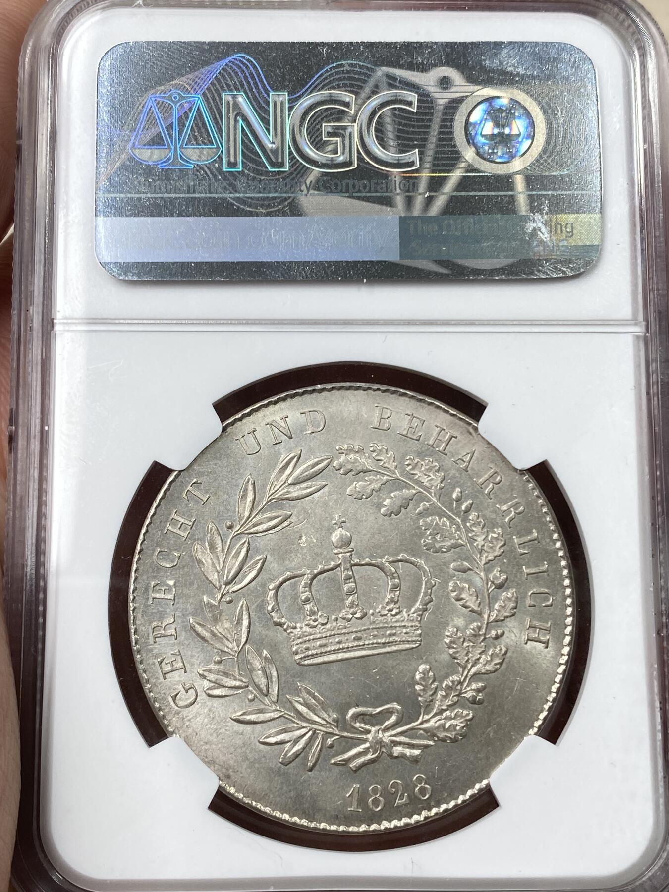 万国钱币拍卖第055期 NGC MS64 1828巴伐利亚路德维希一世皇冠流通大泰勒 流通极其充分的路一皇冠大泰勒 高分难得一见 顶级银霜丝绸转光 NGC唯一冠军分 