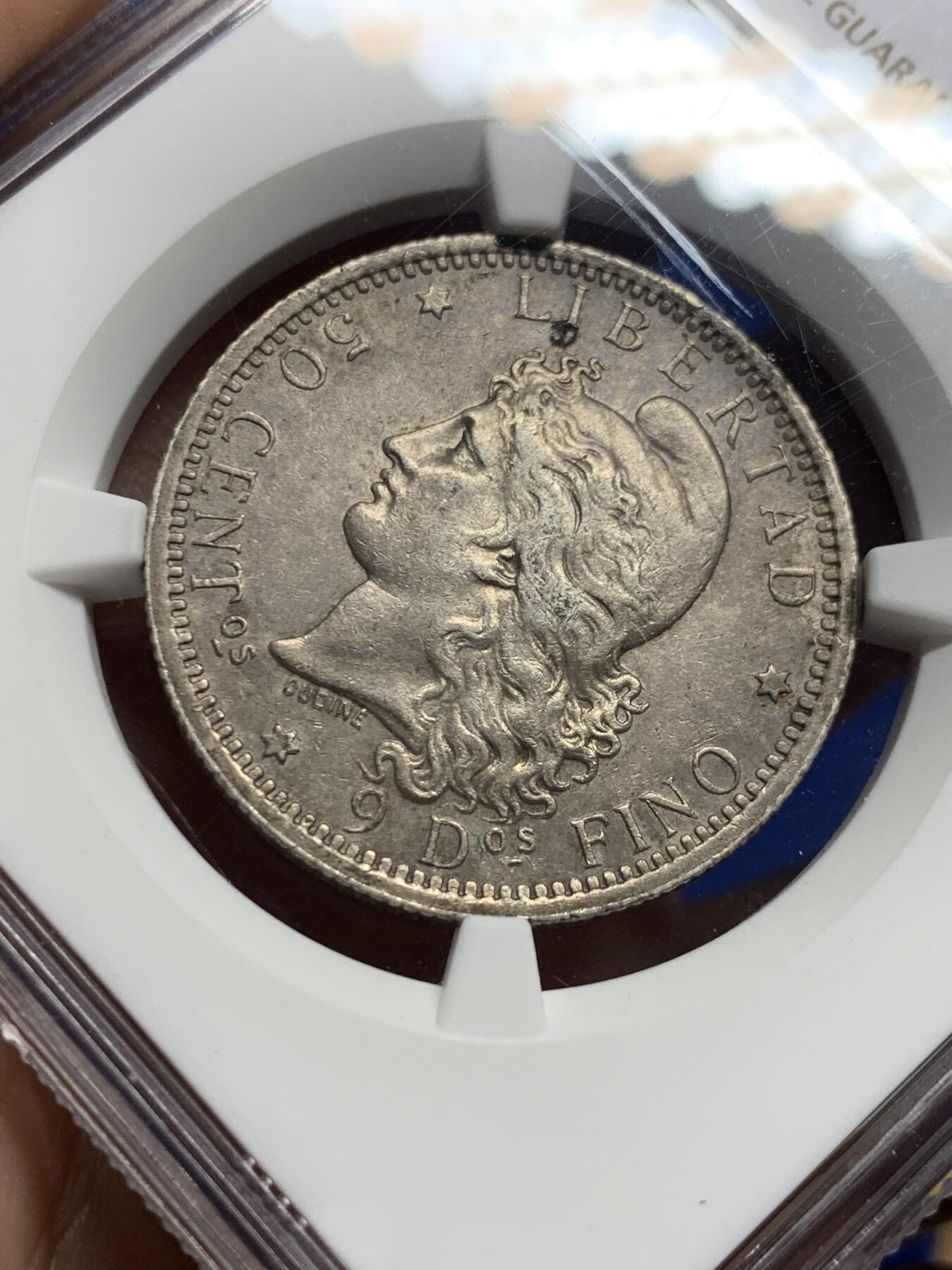 《竞宝斋》第439场 周日，周一，周二 3场连拍 （全场包邮） NGC AU58 阿根廷1883年自由女神50分银币 酱彩金五彩老黑包浆，深打有细节