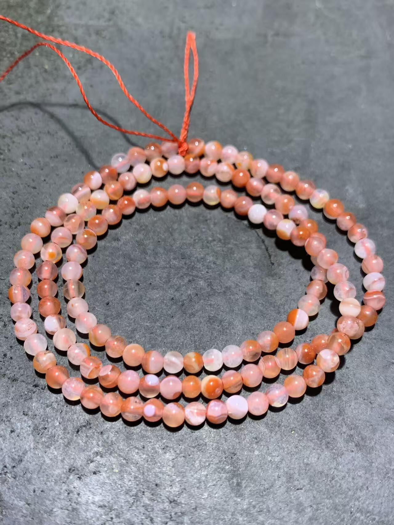 川料荔枝冻飘红南红玛瑙多圈小米珠手串一条，