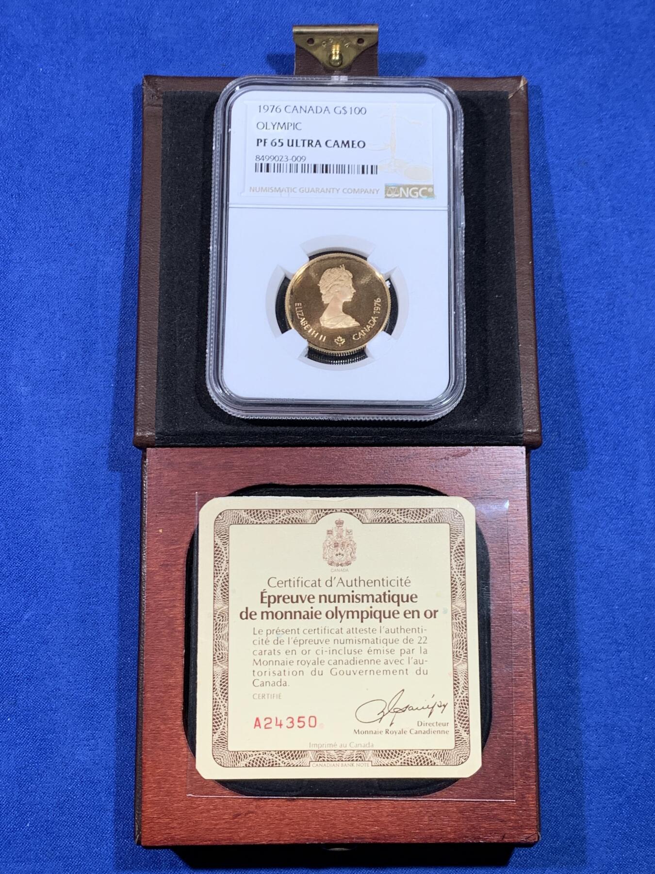 《竞宝斋》第439场 周日，周一，周二 3场连拍 （全场包邮） NGC PF65UC 原光加拿大1976年100元精制金币，真皮原盒带证书齐全，917金  约17g，金价再度上涨，原汁原味品相味道一流。
